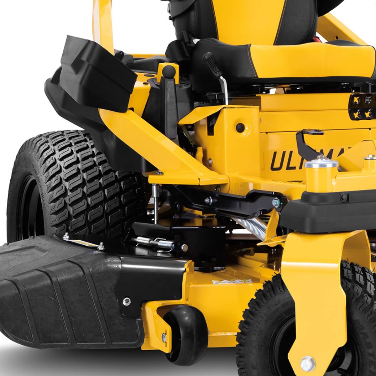 Side view showing the tire tread, anti scalp wheels and seat of this new ride on mower.