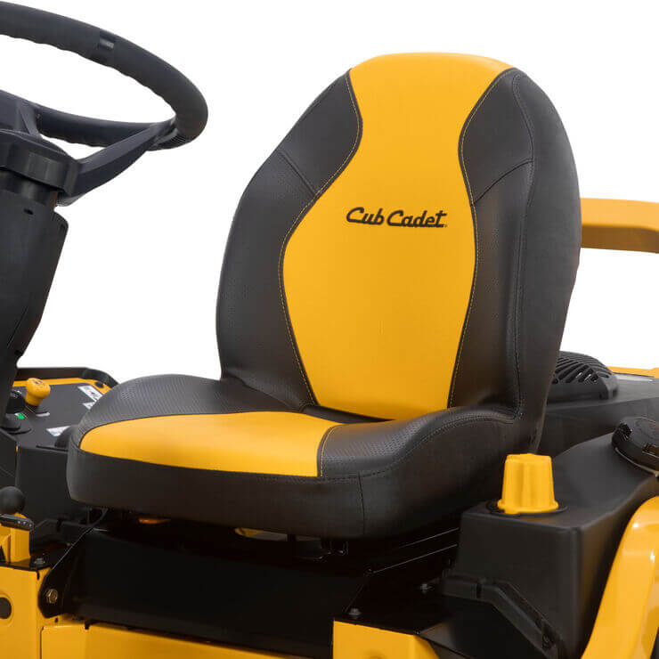 Close-up of a black and yellow Cub Cadet seat and steering wheel on a white background