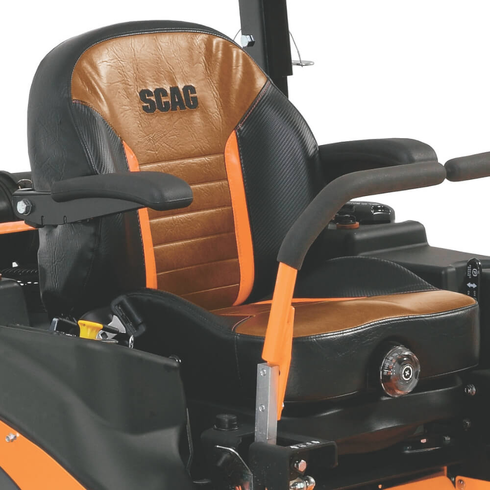 Close-up of a SCAG branded seat on a piece of equipment with a brown and black design.